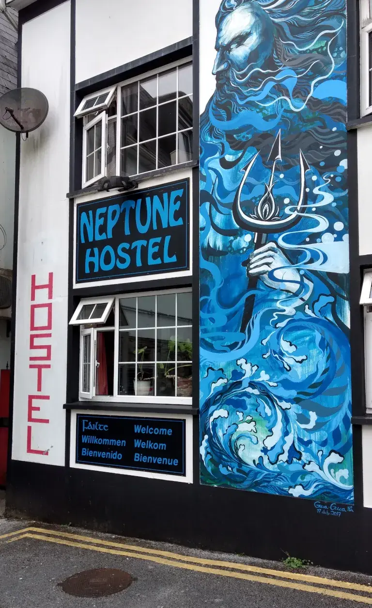 Neptune Town Hostel sign